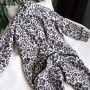 Polarowy romper “Lampart”